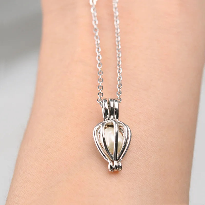 Natürliche Perle in Muschel mit Halskette