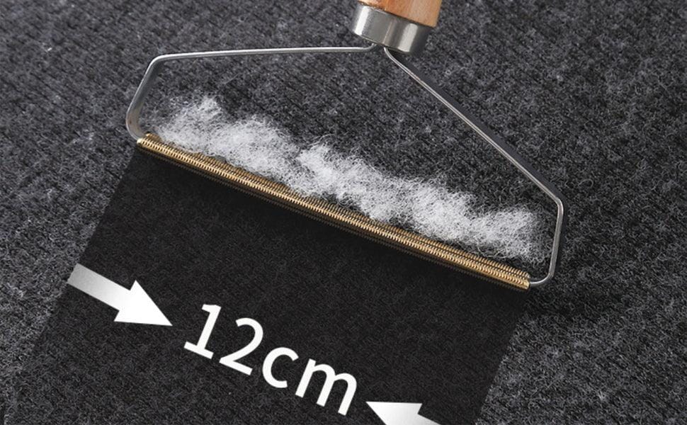 Luddborttagare för Djurhår – Effektiv & Manuell Tygskrapa