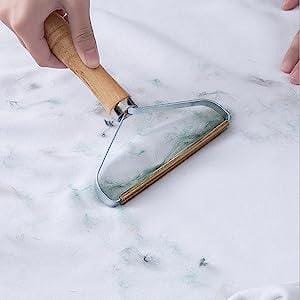 Luddborttagare för Djurhår – Effektiv & Manuell Tygskrapa