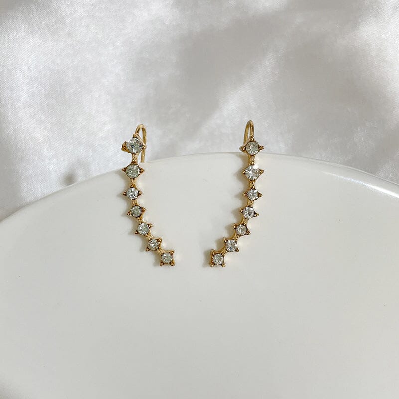 Örhänge med sju stjärnor och diamanter